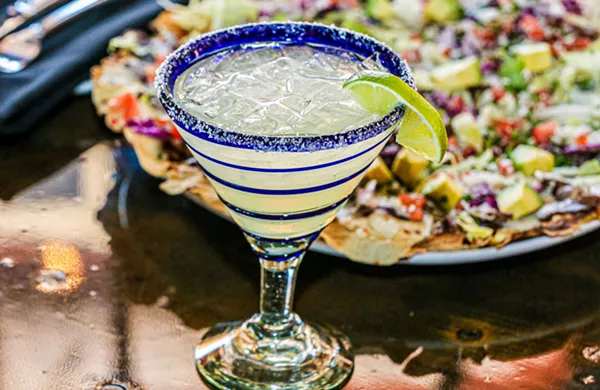 According to Google Trends, Texans have consistently turned to an old tequila standby, the margarita, for comfort during the COVID-19 pandemic. - PEXELS / SABEL BLANCO