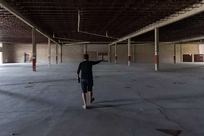 Jon Hinojosa gives a tour of the new SAY Sí space recently. - STEPHANIE STOKES / SA HERON / @ESTEFOTOGRAFA