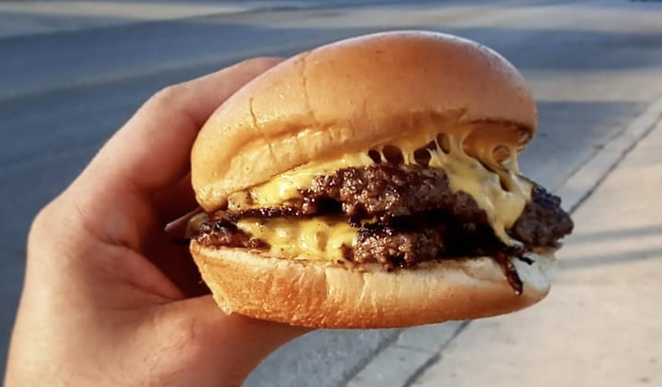 A Slam Daddy is a double cheeseburger, amped up with Chi Chi’s savory Bird Sauce. - INSTAGRAM / CHICHIBIRDSHOTCHICKEN