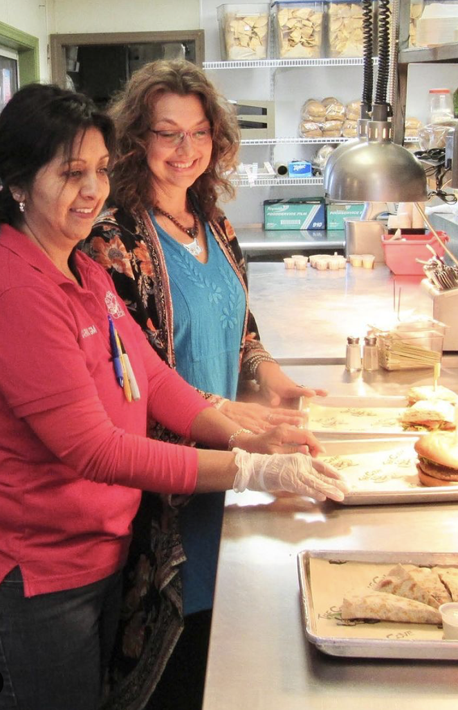 Lisa Asvestas (right) of The Cove added health and wellness plans at her businesses to improve working conditions. - SANFORD NOWLIN