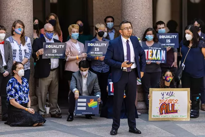 Equality Texas CEO Ricardo Martinez speaks in support of transgender rights at the Texas Capitol on April 12. Texas is one of several states whose legislatures have pushed bills limiting transgender people's sports participation health care options. - TEXAS TRIBUNE / JORDAN VONDERHAAR
