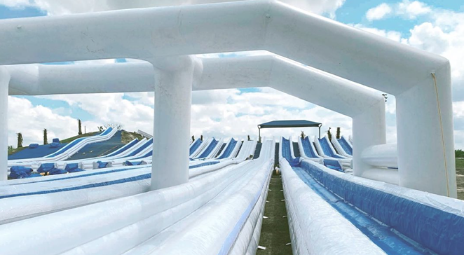 Summer Splash LLC is bringing its Slide the Slopes attraction to the Lone Star State. - INSTAGRAM / SLIDETHESLOPES