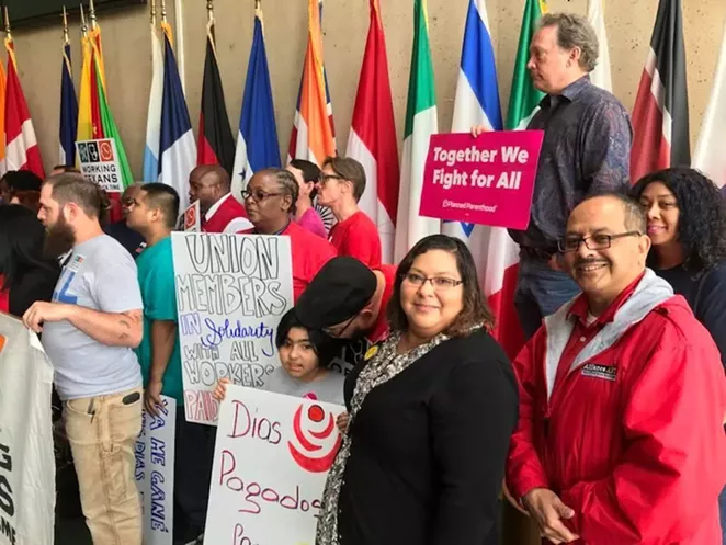 Workers at AFL-CIO Texas rally show their support for mandated paid sick leave. Organizers swayed San Antonio, Austin and Dallas to adopt such policies, but they were overturned in the courts. - PHOTO COURTESY OF AFL-CIO WEBSITE