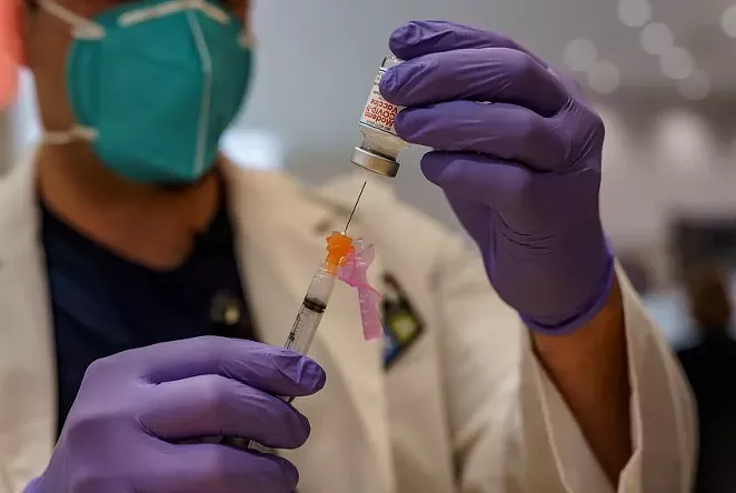 Vials of the Moderna COVID-19 vaccine ready to be administered on Dec. 30, 2020. - TEXAS TRIBUNE / JORDAN VONDERHAAR