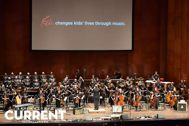 YOSA Philharmonic, led by Director Troy Peters, performing at the YOSA Presents 'Abbey Road' concert. - JAMES GARZA