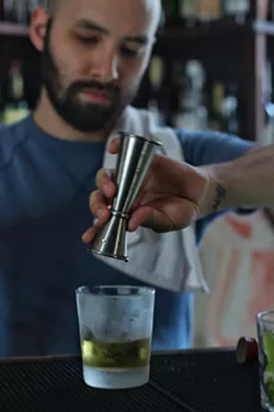 Connor making a happy hour cocktail. - INSTAGRAM/@DRINKING.IN.SA