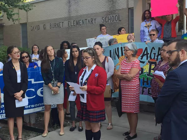 A SAISD speaks out in support of DACA and LGBT students before Monday night's board meeting. - ALEX ZIELINSKI