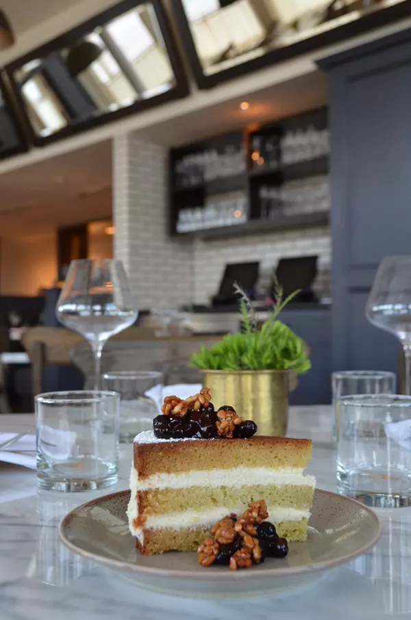 Olive oil cake, pine nut mousse, curried blueberry compote, candied pine nuts from Jenn Riesman of Nonna Osteria. - JESSICA ELIZARRARAS