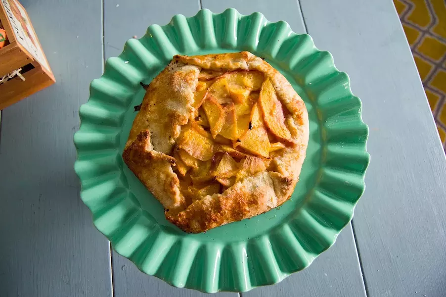 Annie Vu, owner of Annie’s Petite Treats, sources fresh and local fruit like apricots for her seasonal cookies, pies and galettes. - LEA THOMPSON