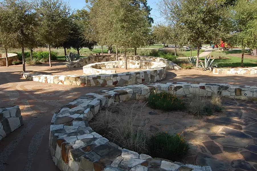 “River Return” uses stone to capture the shape of water. - MICHAEL MARKS