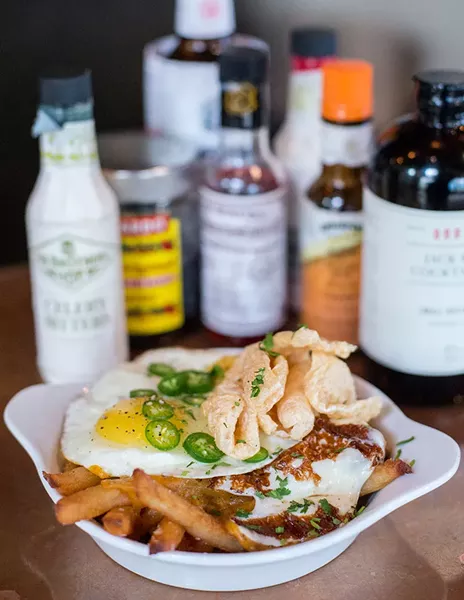Old Main's chicharrón fries. - DAVID RANGEL