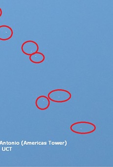 This image purports to show several unexplained flying objects sighted above San Antonio's Tower of the Americas.