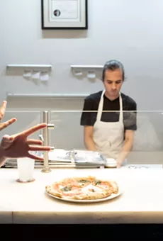 Katie Leclerc shares a scene with the show's titular puppet Waffles.