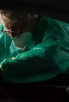 People waited for hours to receive COVID-19 vaccine doses last month at the Fair Park vaccination site in Dallas.