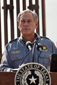 Gov. Greg Abbott puts on his best scowl and faux-military shirt at a recent border press conference.