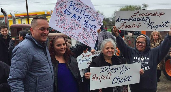 Greg Brockhouse (left) poses with supporters at a campaign event. - SANFORD NOWLIN