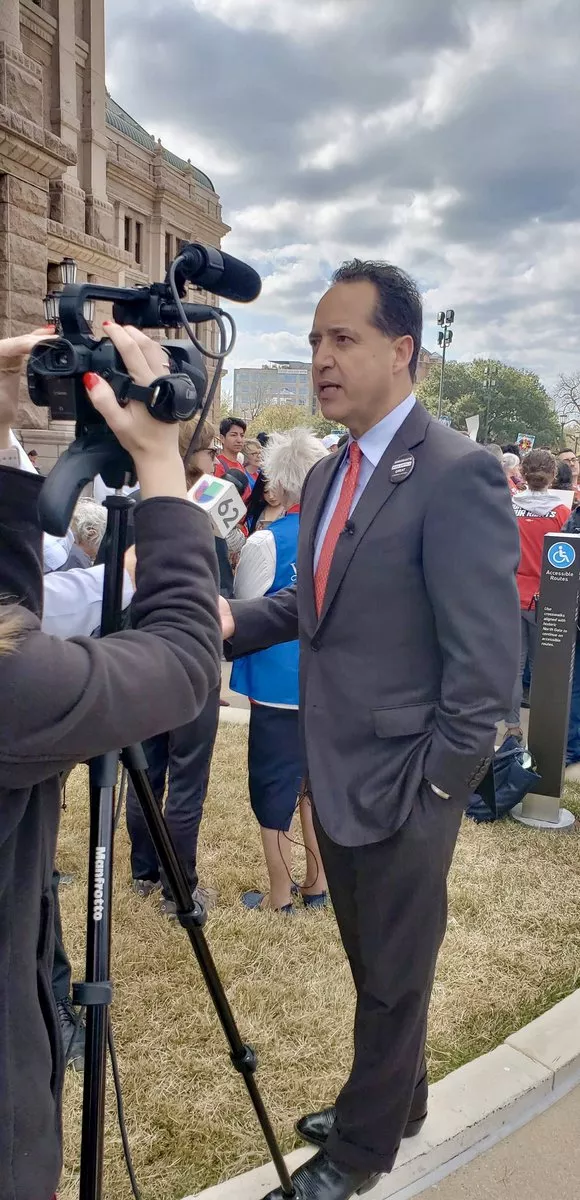Texas Sen. Jose Menendez speaks to TV news crews outside the state capitol. - TWITTER / JOSE MENENDEZ