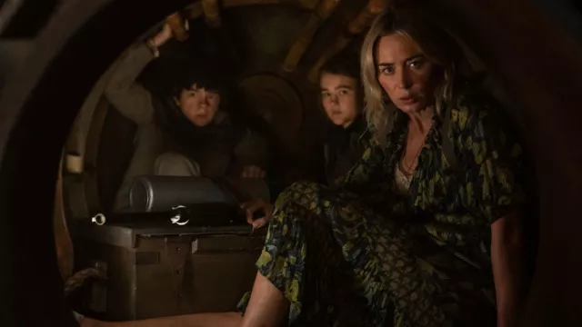 Evelyn (Emily Blunt, far right) and her children, from left, Marcus and Regan, hide inside a furnace to avoid alien attackers in "A Quiet Place Part II" - PARAMOUNT PICTURES