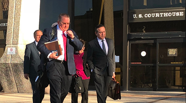 Michael McCrum and Sen. Carlos Uresti leaving the federal courthouse last week. - ALEX ZIELINSKI