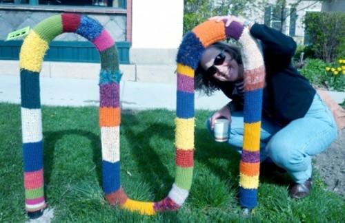 Lisa Sewell with her Jack Mormon Coffee yarn bomb