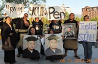 Members of the Raise Your Pen Coalition at a June 2014 event on the Federal Courthouse steps.