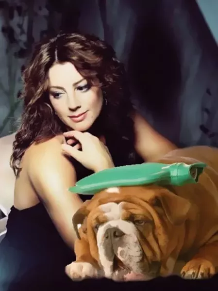 Sarah McLachlan comforts a sick puppy.
