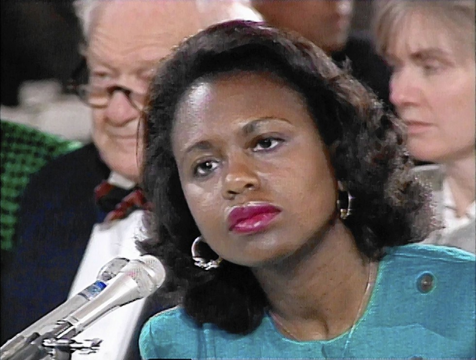Hill testifies against Clarence Thomas during his 1991 confirmation hearings. - SAMUEL GOLDWYN FILMS