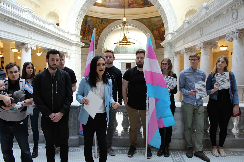 “It does feel like we’re being written out, especially as a transgender youth," Ermiya Fanaeian, center, said on Monday. - RAY HOWZE