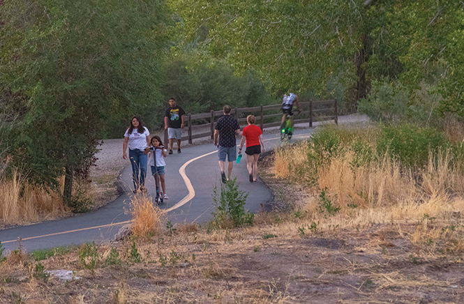 The Jodan River Parkway Trail, completed in 2017, offers a nearly continuous walking and biking path from Utah Lake to the Great Salt Lake. - JORDAN ALLRED