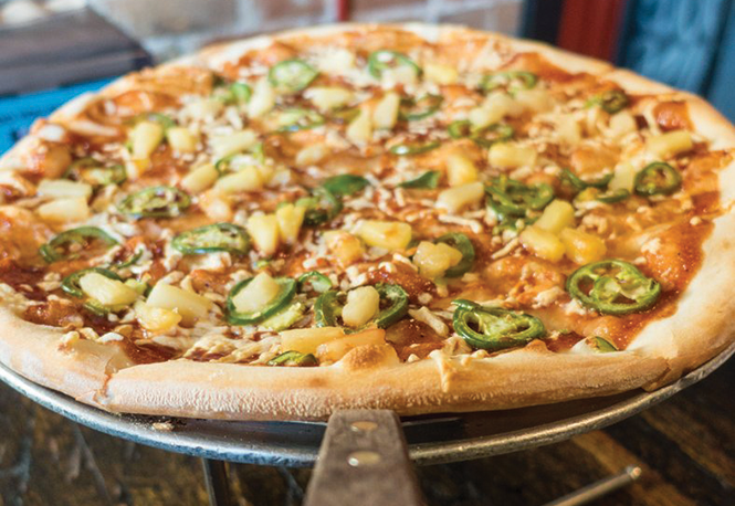 Lucky Slice’s vegan Shirra pizza with barbecue sauce, pineapple, jalepeno and vegan mozzarella - COURTESY PHOTO