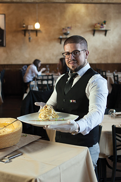 Sicilia Mia co-owner Giuseppe Mirenda serves up a gorgeous carbonara while reminescing about his grandmother’s lasagne. - JOHN TAYLOR