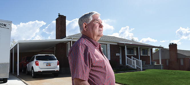 Duane Sjoberg, 81, poses on the driveway of his home, which he bought in unincorporated Davis County more than 50 years ago. - BEN TECUMSEH DESOTO