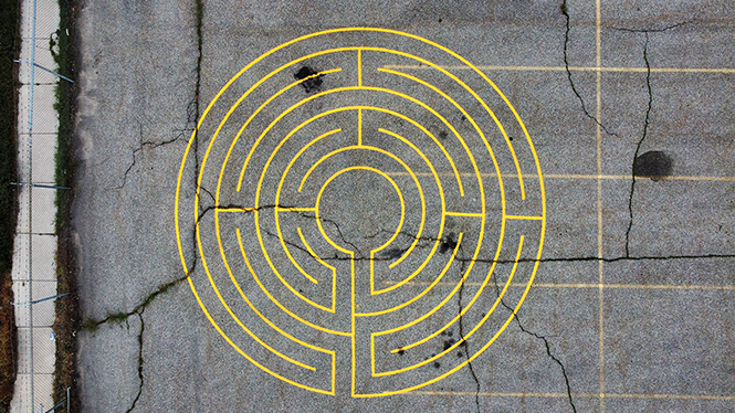 A brightly colored maze decorates a parking lot near the Commonwealth Room and the Center for Spiritual Living. - BRYANT HEATH