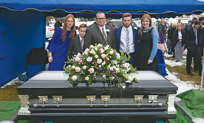 Brock Marchant, second from right, with his father and siblings at his mother’s funeral. - COURTESY PHOTO