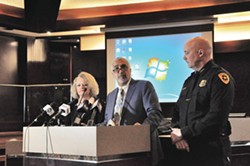 Salt Lake County District Attorney Sim Gill, flanked by Mayor Jackie Biskupsi and Police Chief Mike Brown, said Officer Matthew Taylor was justified in the 2015 shooting death of James Barker. - COLBY FRAZIER