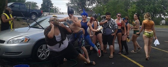 Anarchy Girls Cospace grand opening event, Cosplay Carwash, (right to left) Stephen Burress, Nathan Sims, James C Carlson, Madison Lindgren, Elly Swedberg, Zack Sims, Sarah Jane Eaton, Morgen Yoakum, Noelle Cummings, - DERRICK HAMPSON
