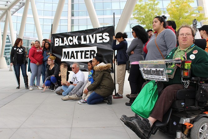 Black Lives Matter supporters rally outside the Public Safety Building on Saturday, Sept. 30 to demand Patrick Harmon body-cam footage be released. - ENRIQUE LIMÓN