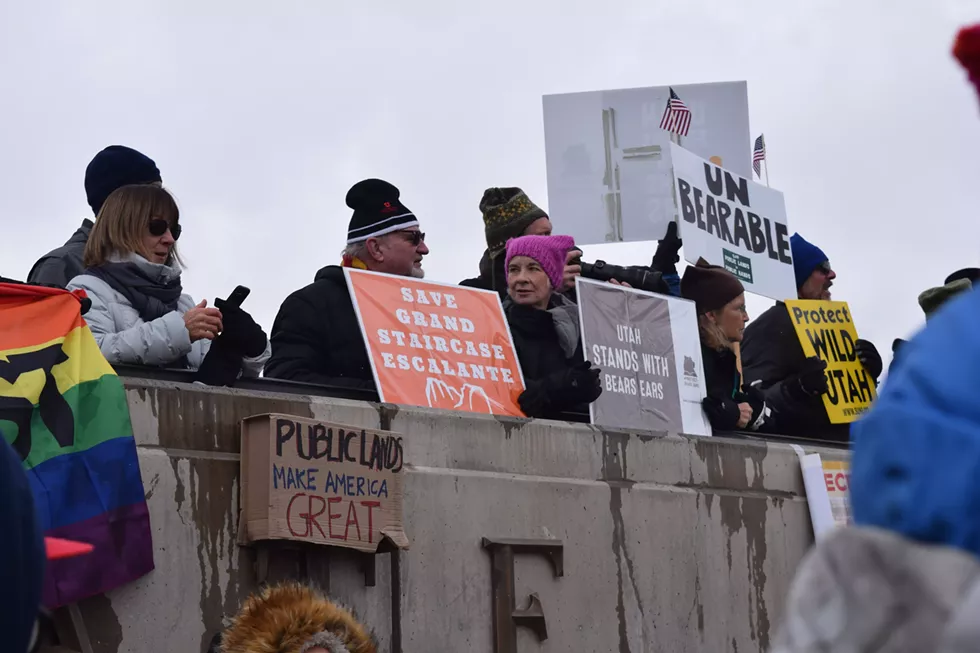 Alan Eastman, middle, and Vickie Eastman, middle right, stand in front of the Utah State Capitol Building. - RAY HOWZE