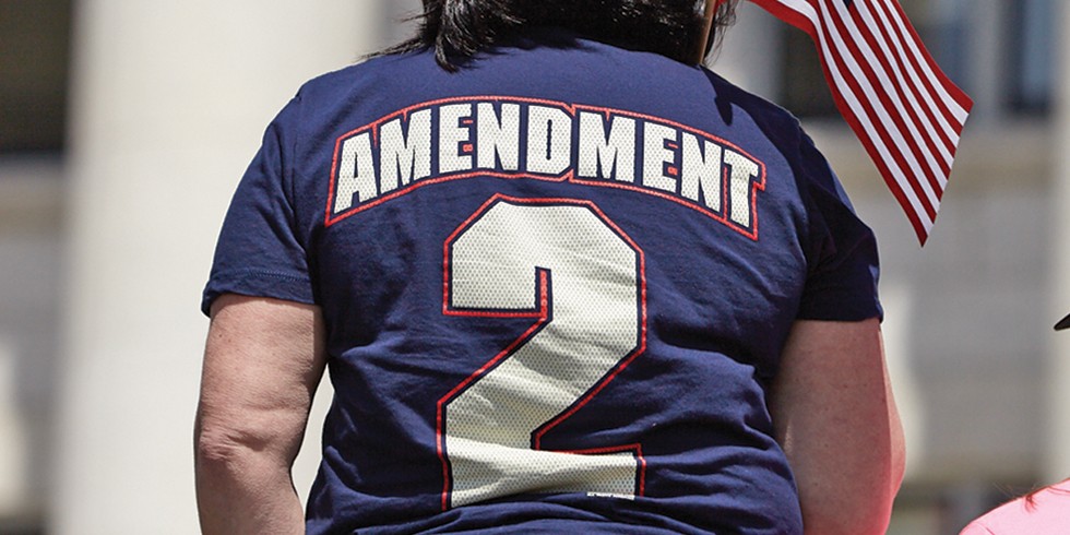 A Second Amendment supporter attends a pro-gun rally at the Utah Capitol steps on Saturday, April 14. - SARAH ARNOFF