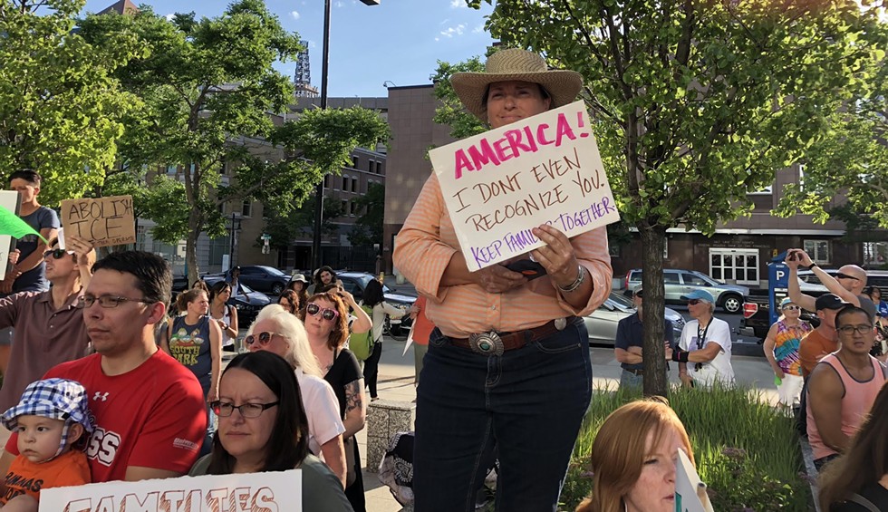 A scene from Thursday's Families Belong Together protest outside the Wallace Bennett Federal Bldg. - KELAN LYONS