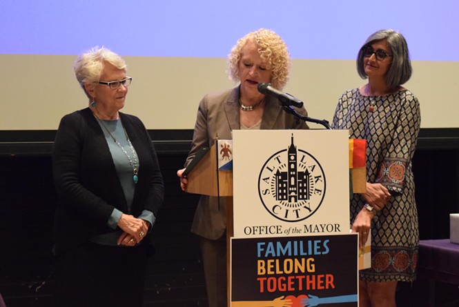 Rep. Carol Spackman Moss, left, Mayor Jackie Biskupski, middle, and Asha Parekh, director of refugee services at the Utah Department of Workforce Services, recognize refugees in Salt Lake City as part of World Refugee Day. - RAY HOWZE