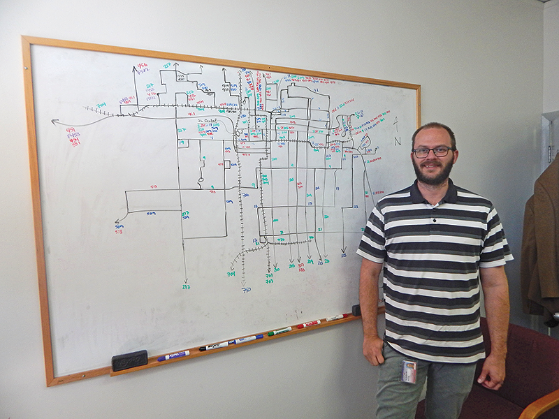 Eric Callison, UTA’s manager of service planning, maps out Salt Lake City’s transit system. - PETER HOLSLIN