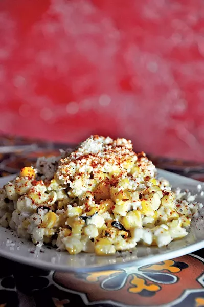 Street cart-style corn at Alemexo - DEREK CARLISLE