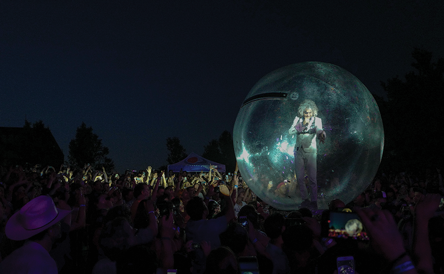 The Flaming Lips’ Wayne Coyne being his Wayne Coyniest during last year’s Ogden Twilight kickoff. - STEVE CONLIN