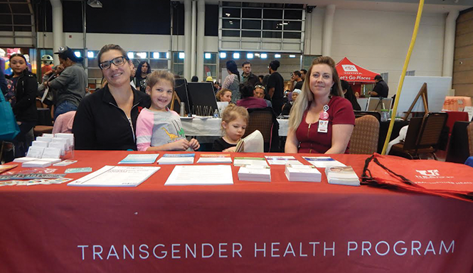 Jerica Pixton, left, and Ariel Malan, with Pixton’s kids in tow, participate in an annual health fair to reach out to Latinx communities. “There’s always work to be done,” Pixton said.