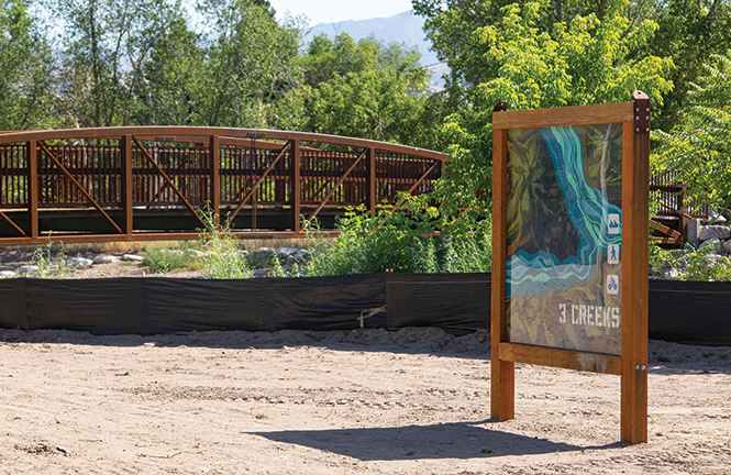 A new pedestrian bridge connects the Jordan River Parkway trail with Three Creeks Confluence, a new river park where the Red Butte, Emigration and Parleys creeks meet the Jordan River. - JORDAN ALLRED