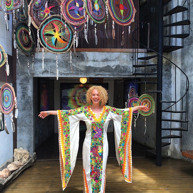 Nora Heilman in a hand-embroidered wedding gown at Pachamama