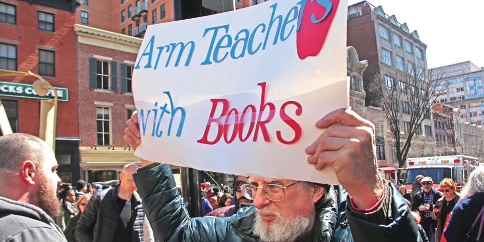 A teacher at Washington, D.C.’s March for Our Lives schools attendees. - AVERY JENSEN