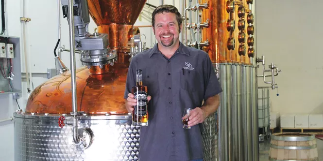 Eric Robinson, master distiller at Sugar House Distillery - DARBY DOYLE