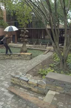 A neighbor tests the wall - MATTHEW THORSEN